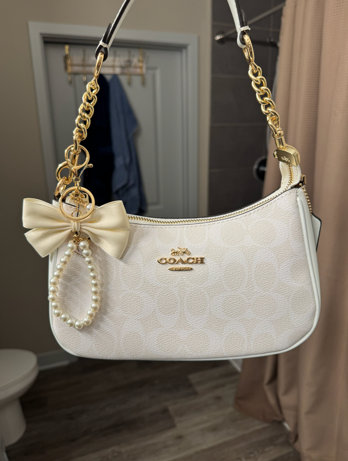 White Purse With White Bow