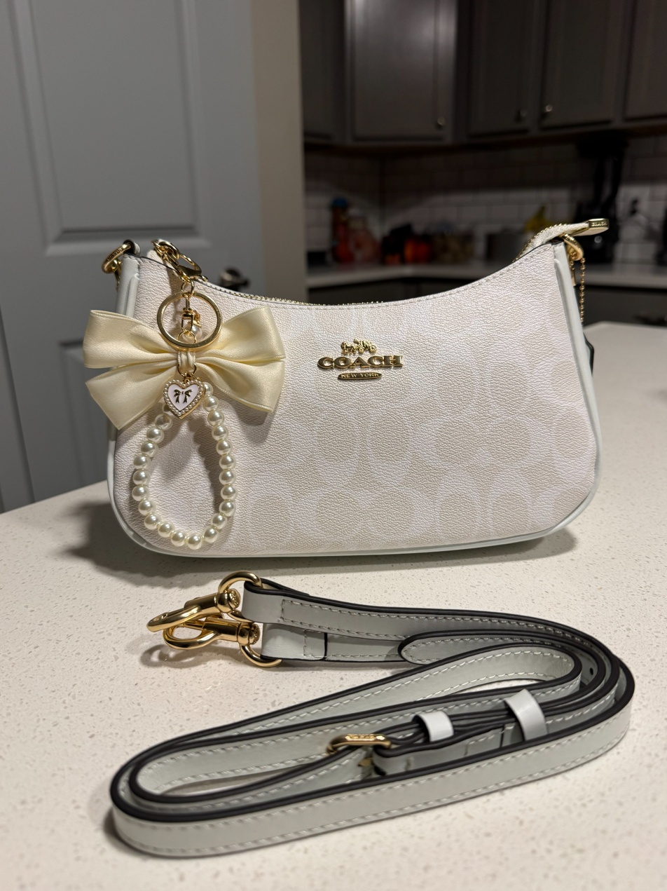 White Purse With White Bow